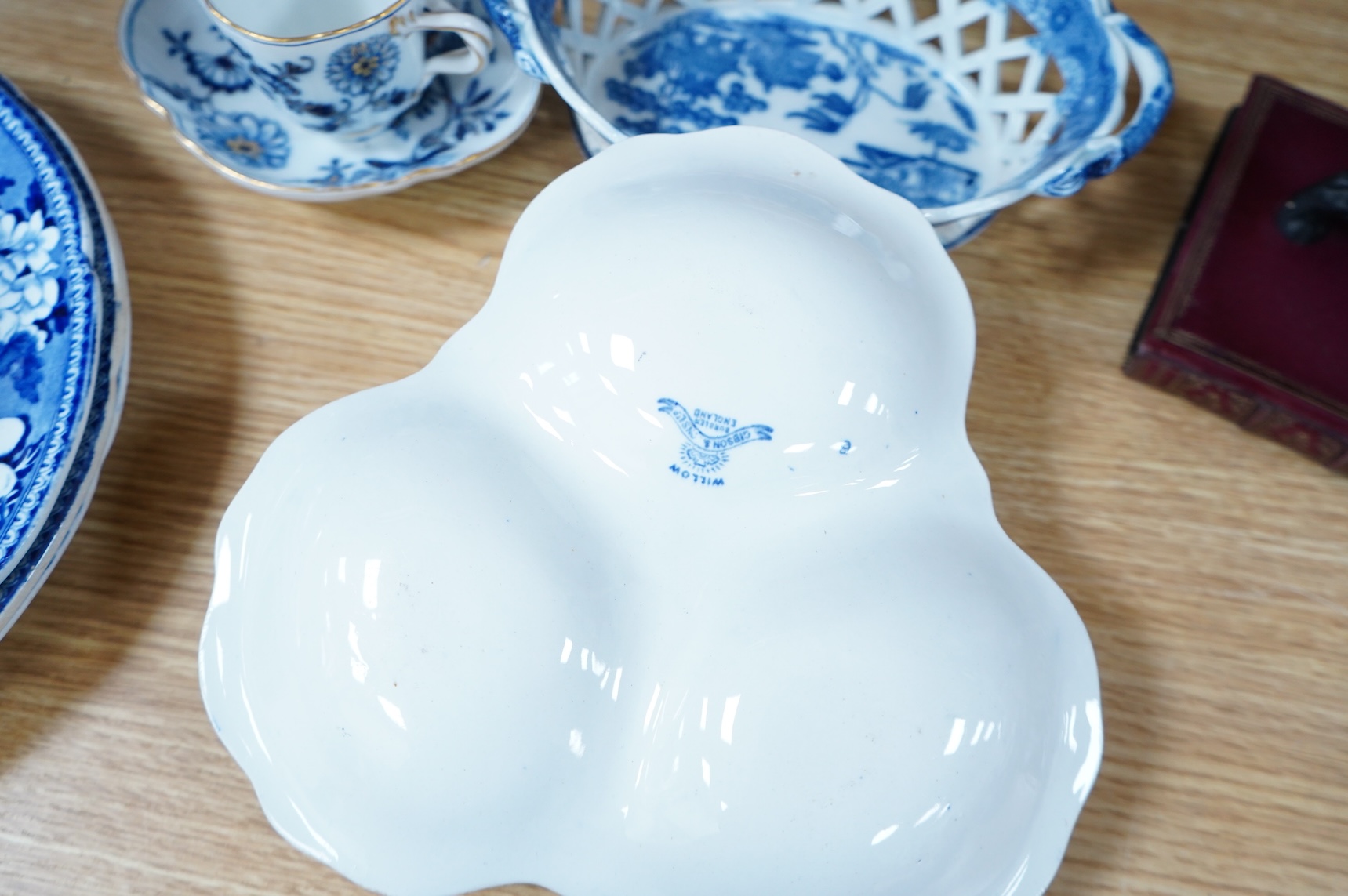 A group of blue and white Willow pattern china, 19th century and later and a Meissen cup and. Saucer. (12).
